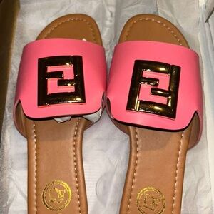 DKNY Pink Slide Sandals with Gold Logo Accent